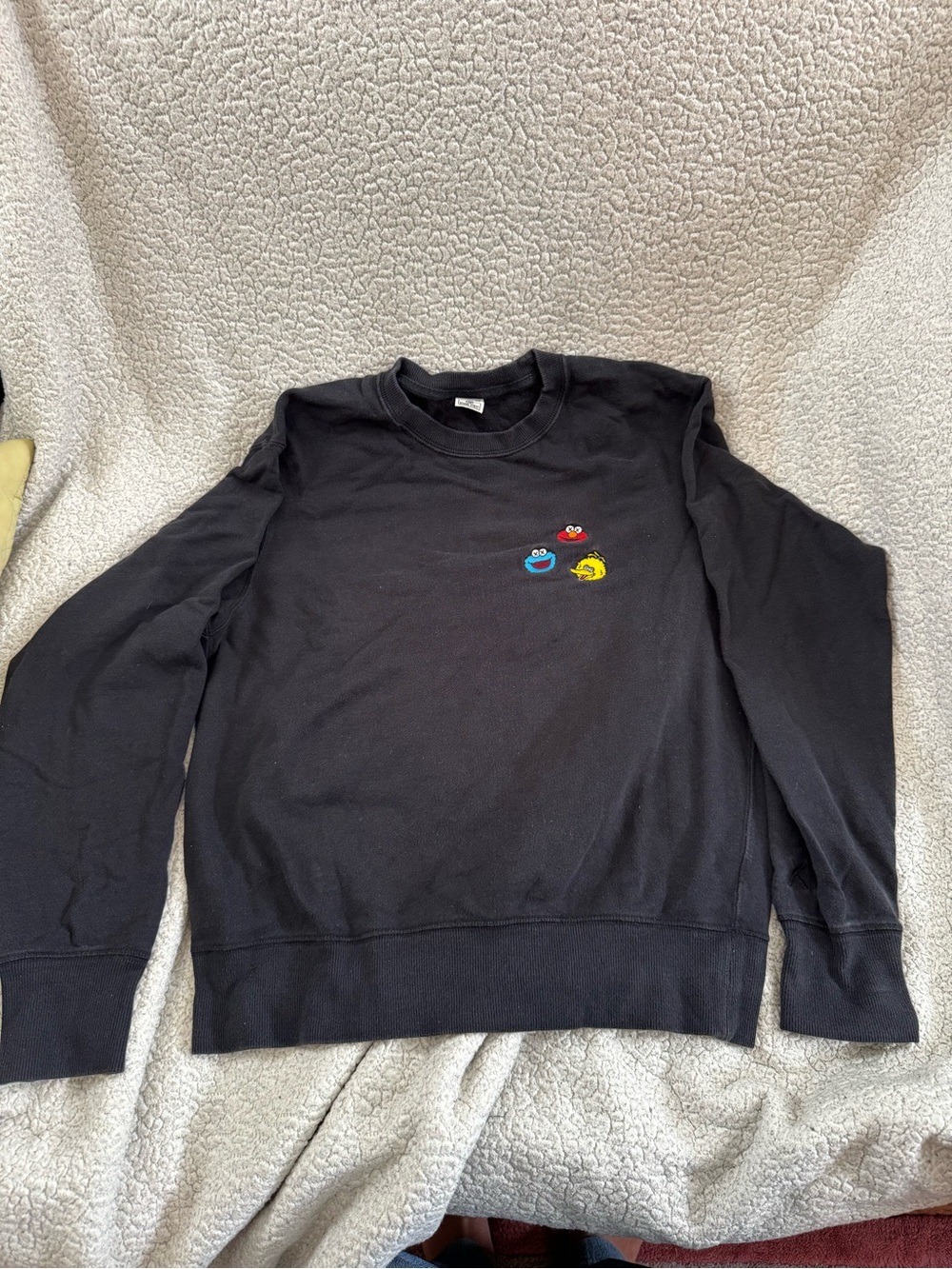 Uniqlo KAWS Sesame Street embroidered crew neck pull over
